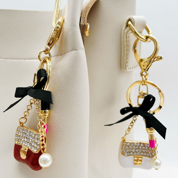 Wholesale Rhinestone Lipstick Bow Zinc Alloy Keychain JDC-KC-ZhanLun008