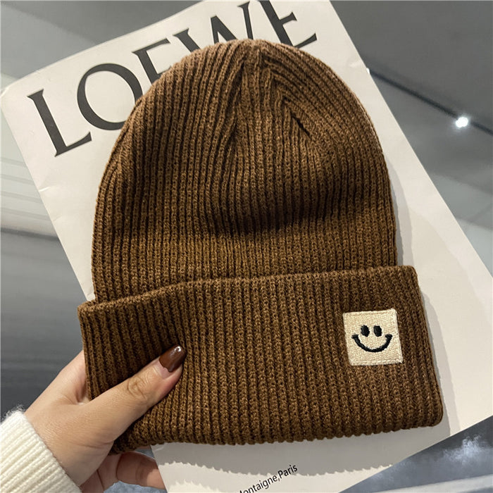 Wholesale Autumn and Winter Cute Smiley Face Logo Wool Knitted Hat JDC-FH-Yizhan002