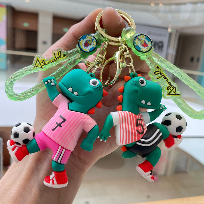 Wholesale Creative new football dinosaur keychain, exquisite and cute soft plastic figurine pendant, bag accessories, small gifts