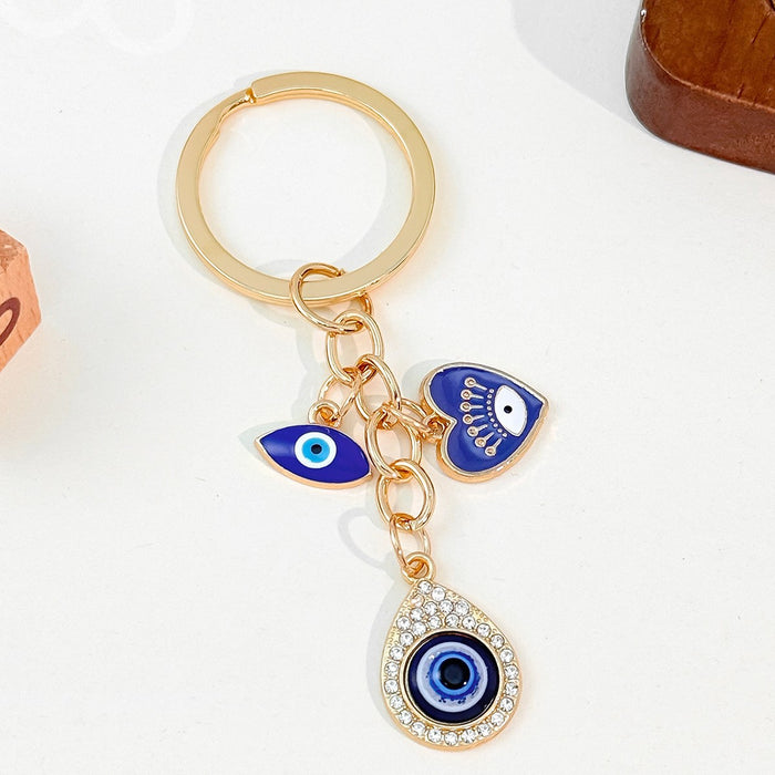 Wholesale Heart-Shaped Palm Water Drop Devil's Eye Pendant Keychain