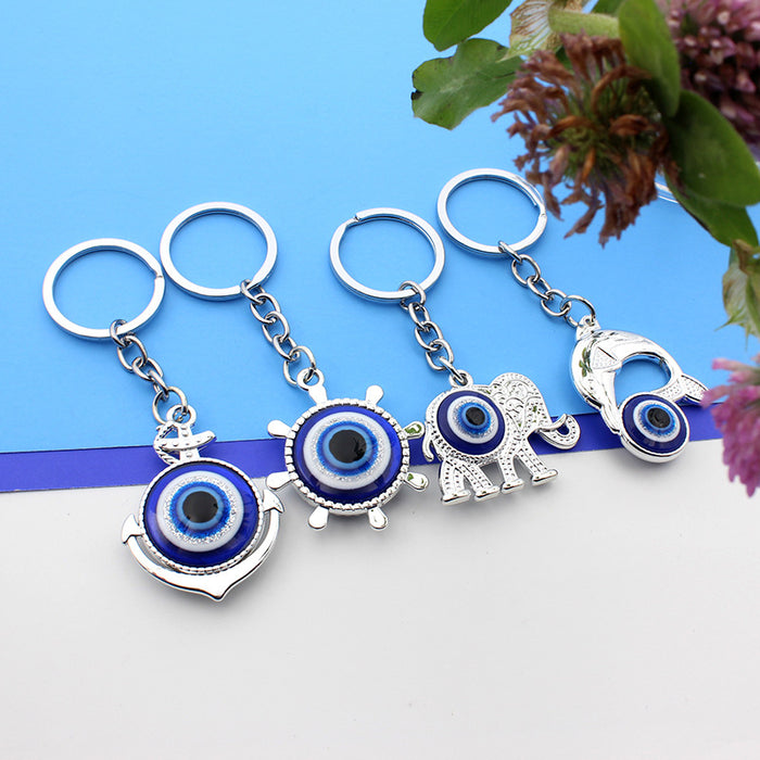 Wholesale Silver boat anchor, rudder, blue eyes, keychain, bag hanging