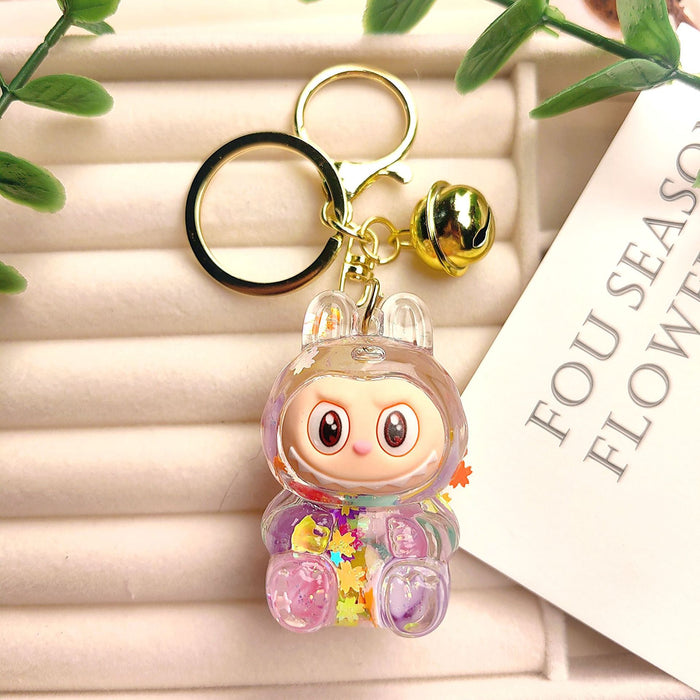 Wholesale Creative oil-filled quicksand bottles keychain