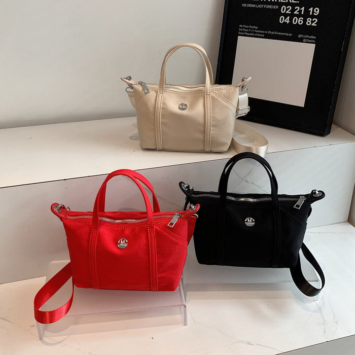 Wholesale Pure Color Dumpling Bag Nylon Canvas Bag Casual Shoulder Bag