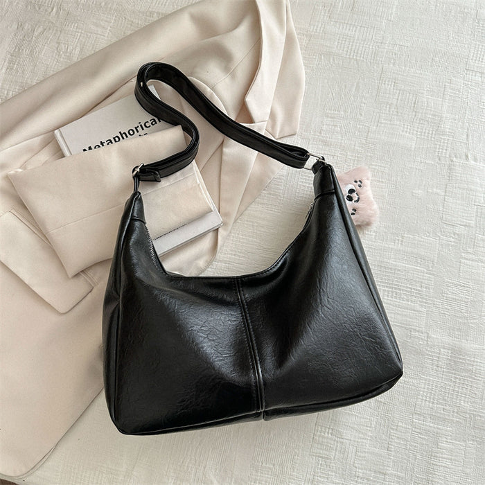 Wholesale Personalized retro tote bag for commuting, fashionable crossbody, simple shoulder bag