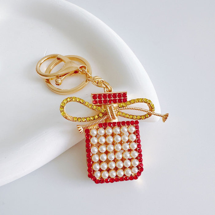 Wholesale Alloy Diamond Tassel Bow Pearl Perfume Bottle Keychain JDC-KC-ZhanLun017