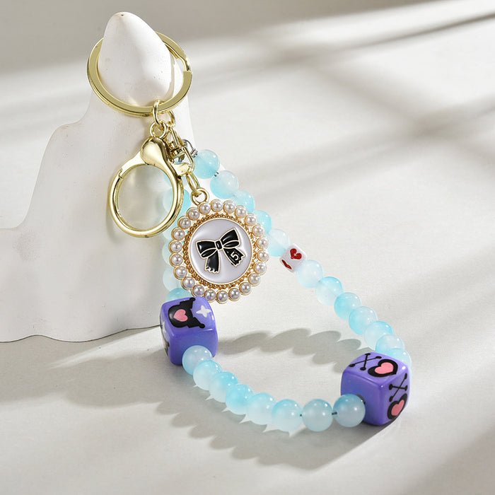Wholesale Glass bead round brand bow keychain