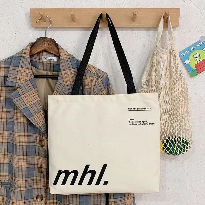 Wholesale New canvas bag, niche letter printed shoulder bag, large capacity commuting tote bag