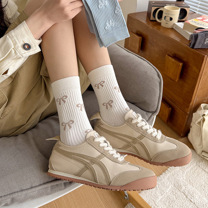 Wholesale Butterfly knot socks, children's mid tube socks, pile socks, boneless long tube socks, fashionable women's socks