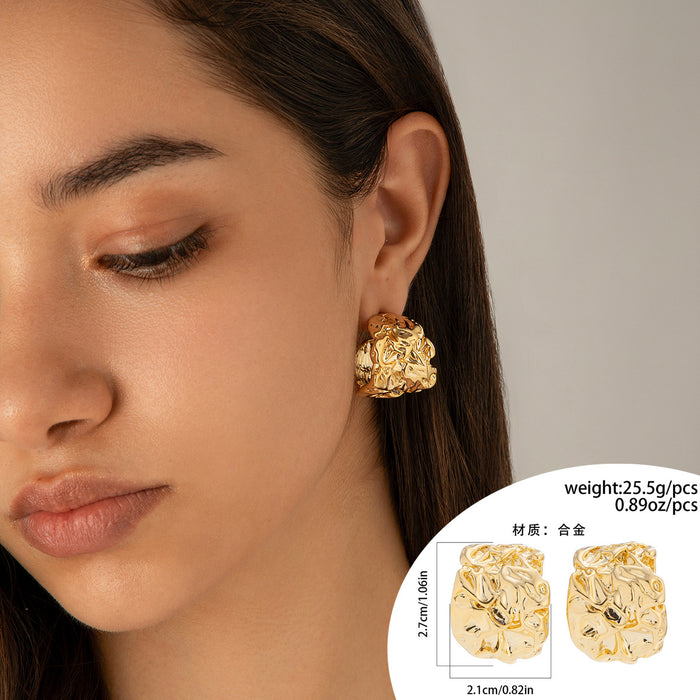 Wholesale Personalized lava heart-shaped liquid droplet earrings with irregular geometric folds