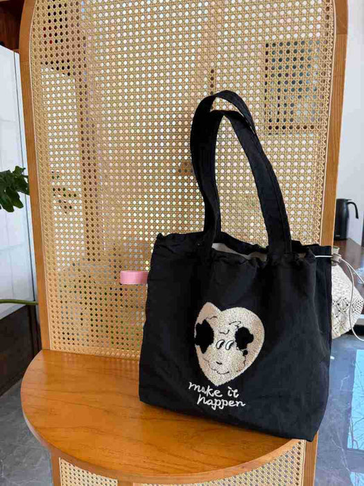 Wholesale New cartoon embroidery drawstring shoulder bag, casual canvas bag, large capacity commuting bag