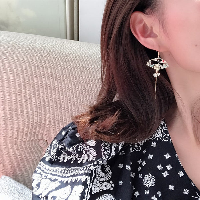Wholesale Silver ear hook creative personality asymmetric tassel earrings