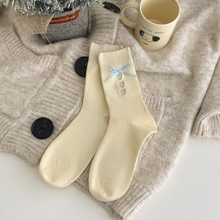 Wholesale Embroidered heart-shaped tube socks with blue ribbon and bow, stacked socks