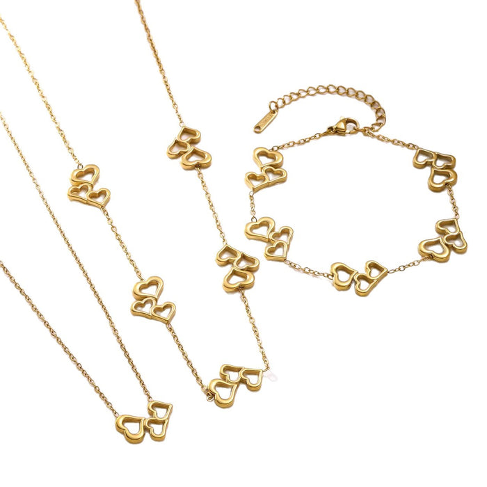 Wholesale Hollow out three-heart stainless steel necklace and bracelet set