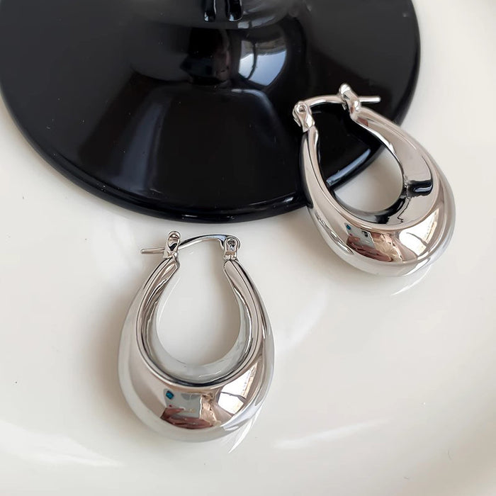 Wholesale Small niche design, high-end feel, light luxury, versatile earrings, silver water droplet earrings, exaggerated earrings, new product