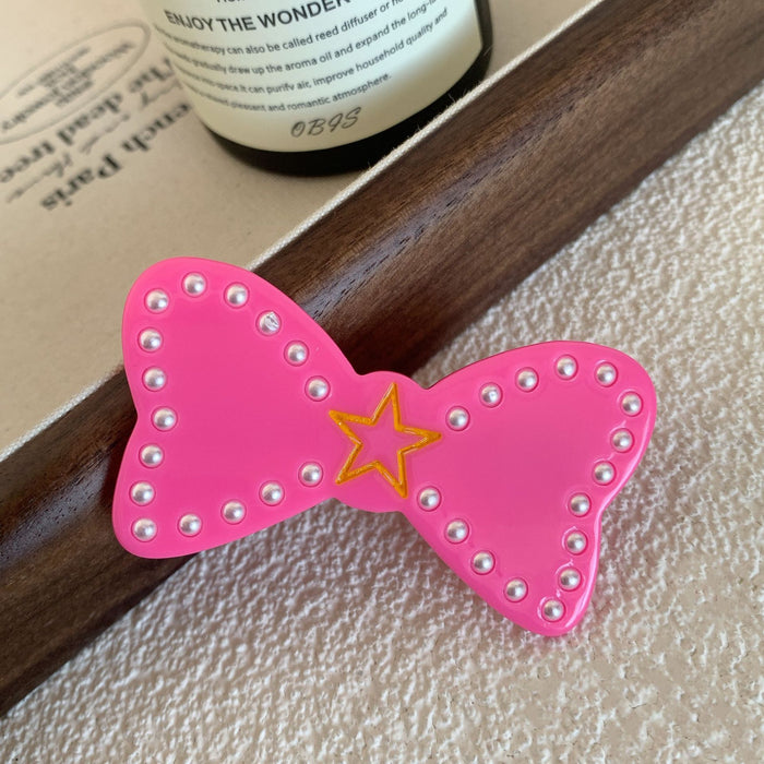 Wholesale Sweet new duckbill clip cute five-pointed star bow hairpin high-end pearl side clip hair accessories