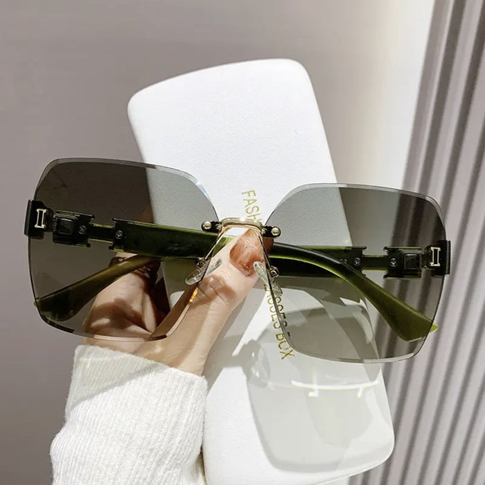 Wholesale Advanced frameless sunglasses, fashionable outdoor UV protection, driving sunshade