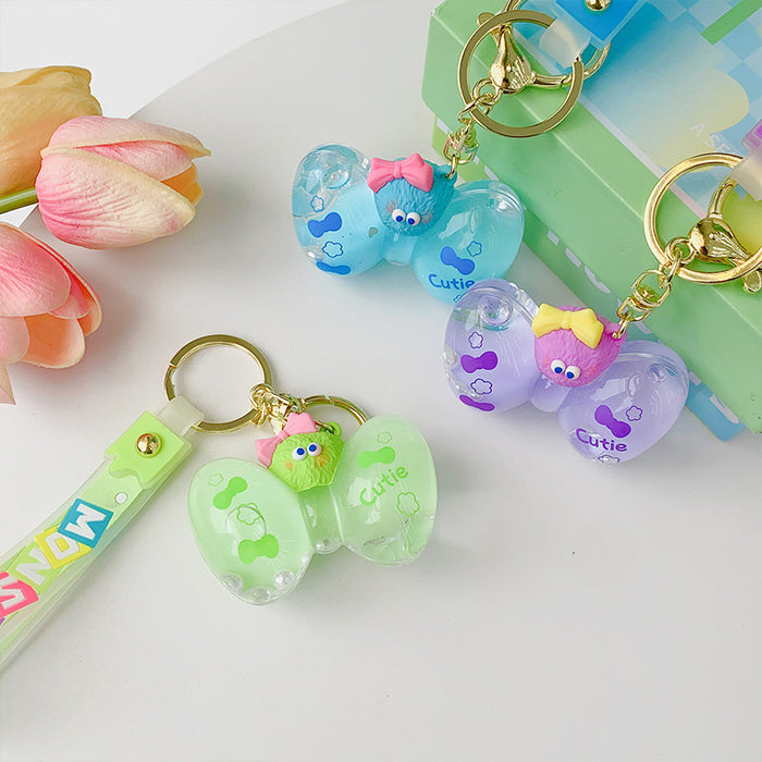 Wholesale PVC Liquid Oil Bowknot Cartoon Keychain JDC-KC-DiAJ001