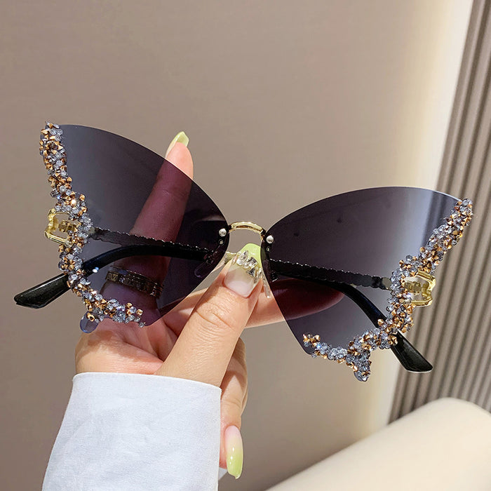 Wholesale Butterfly Shape Diamond Frameless PC Sunglasses JDC-SG-MNY001