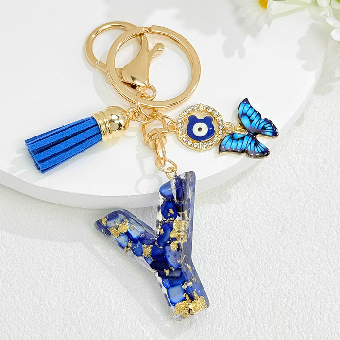Wholesale Royal Blue 26 Letter Keychain with Evil Eye Butterfly Tassel Pendant