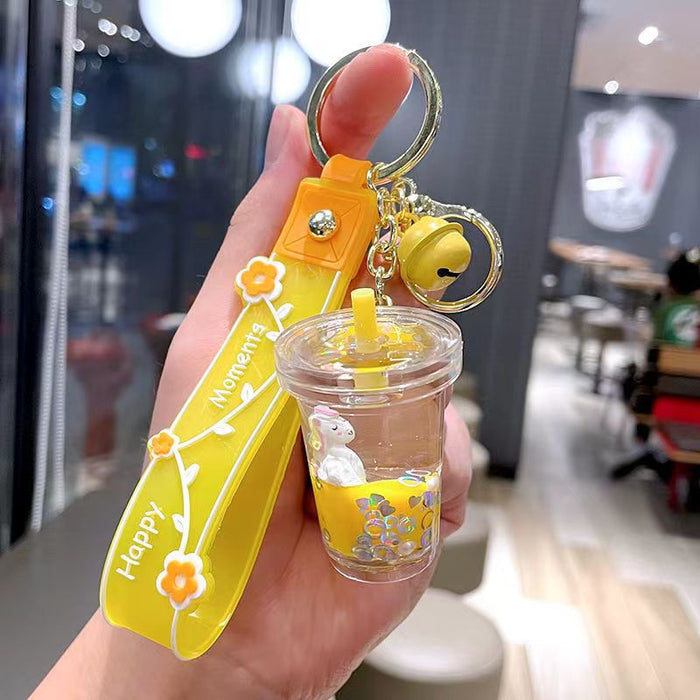 Wholesale Cute milk tea cup unicorn oil quicksand key chain rainbow horse bag hanging ornaments grab baby machine small gifts