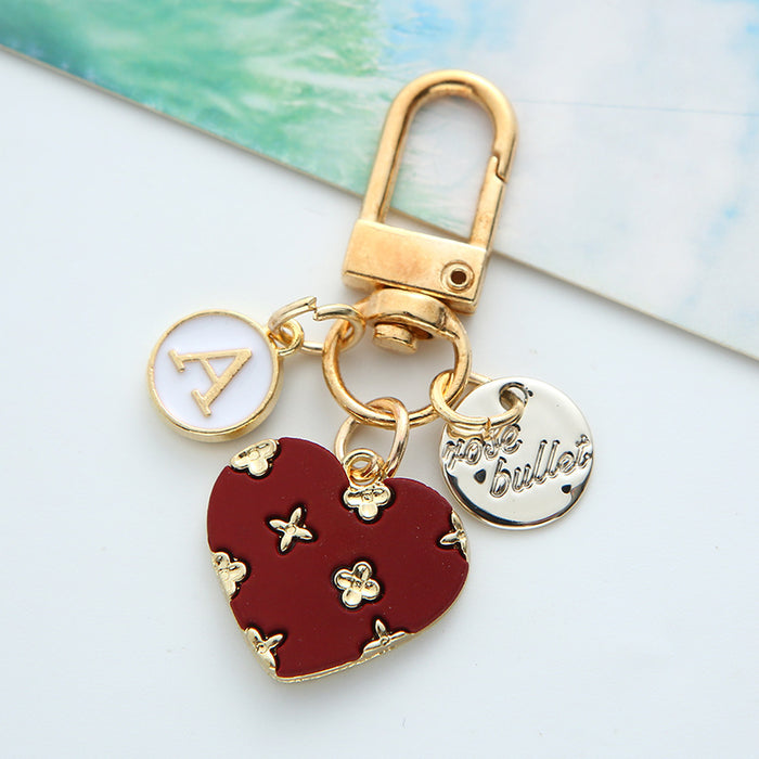 Wholesale alloy love keychain pendant hollow small flower letter round card accessories