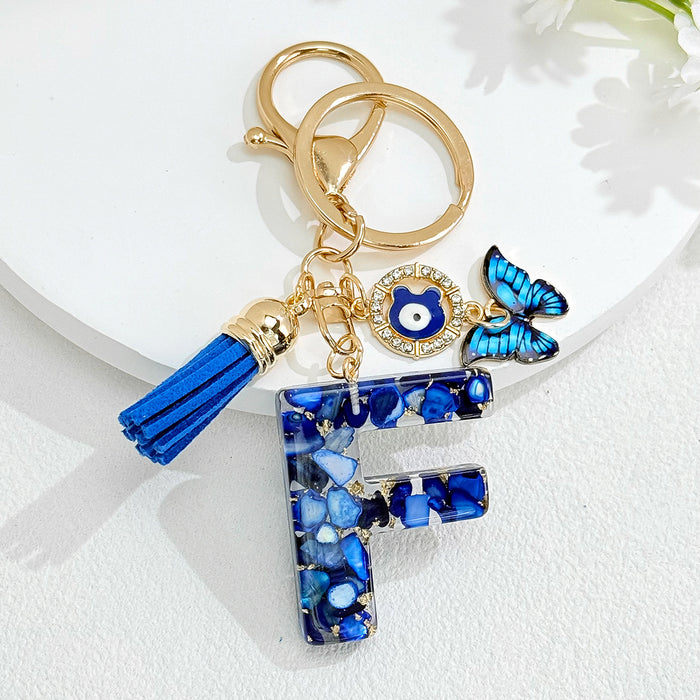 Wholesale Royal Blue 26 Letter Keychain with Evil Eye Butterfly Tassel Pendant