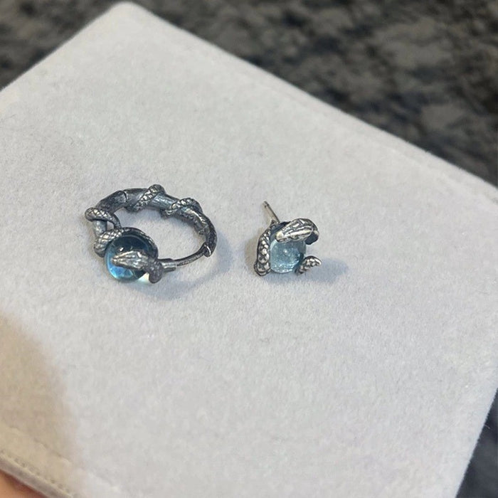 Wholesale Silver snake wrapped imitation moonstone ear buckle, light luxury, niche high-end design, spirit snake earrings, versatile earrings