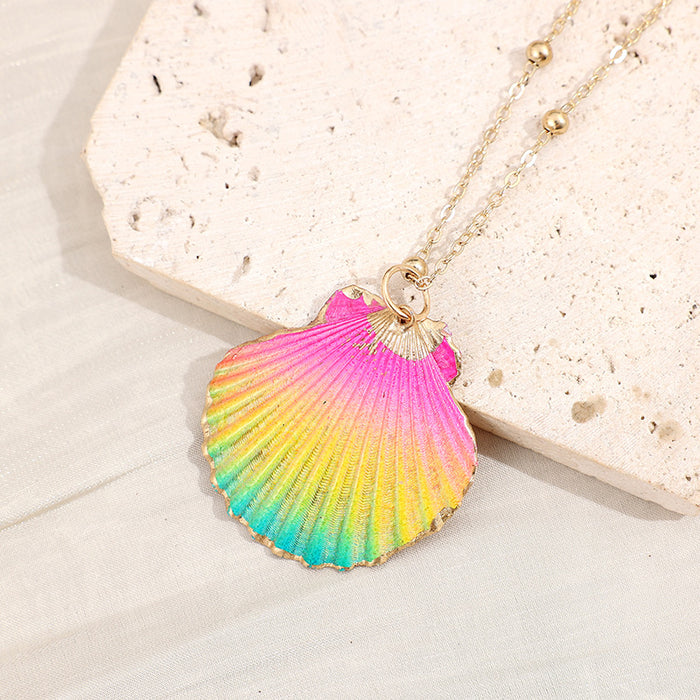 Wholesale Gold edged conch and seashell necklace