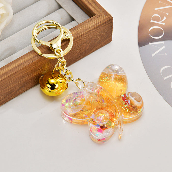 Wholesale Acrylic oil-filled glitter butterfly keychain