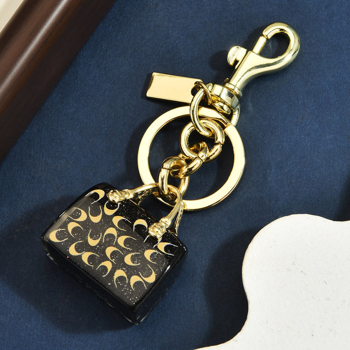 Wholesale Chic Letter C Bag Charm Keychain Red Alloy Electroplated Women S Purse Pendant Gift Resale