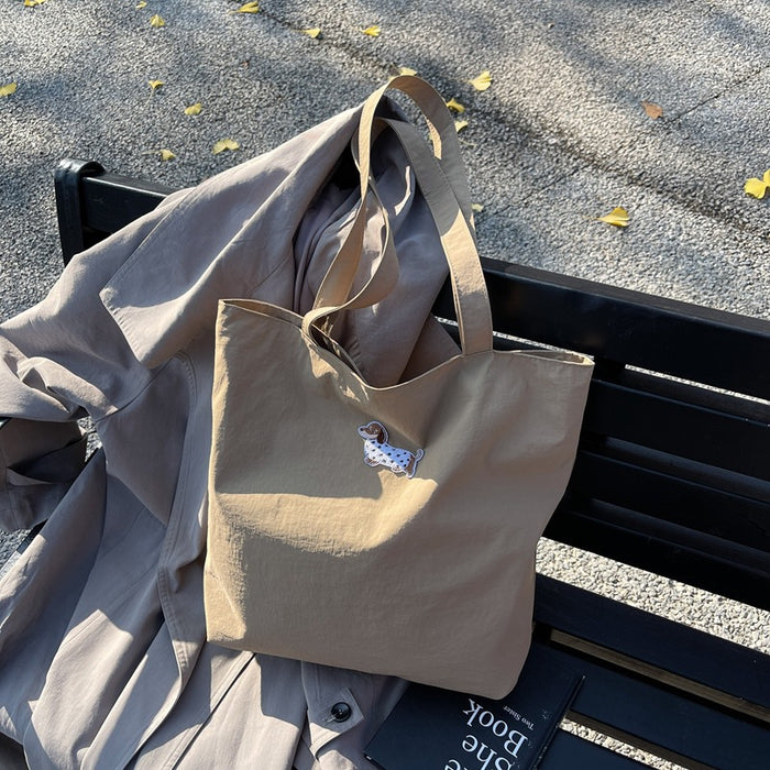 Wholesale Large capacity canvas bag, niche commuting handheld, high-end fashion shoulder bag