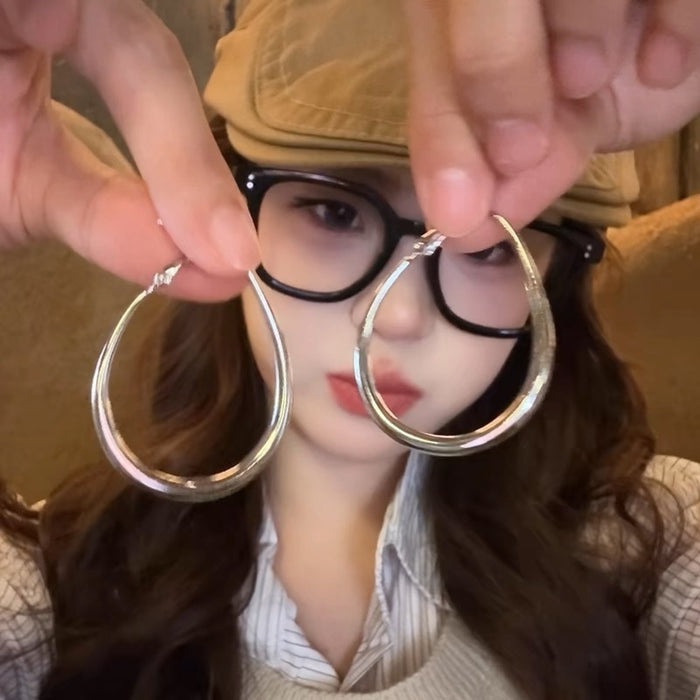 Wholesale Silver needle earrings with circular earrings, light luxury and high-end feel. Exaggerated large earrings and earrings