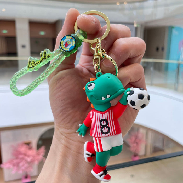 Wholesale Creative new football dinosaur keychain, exquisite and cute soft plastic figurine pendant, bag accessories, small gifts