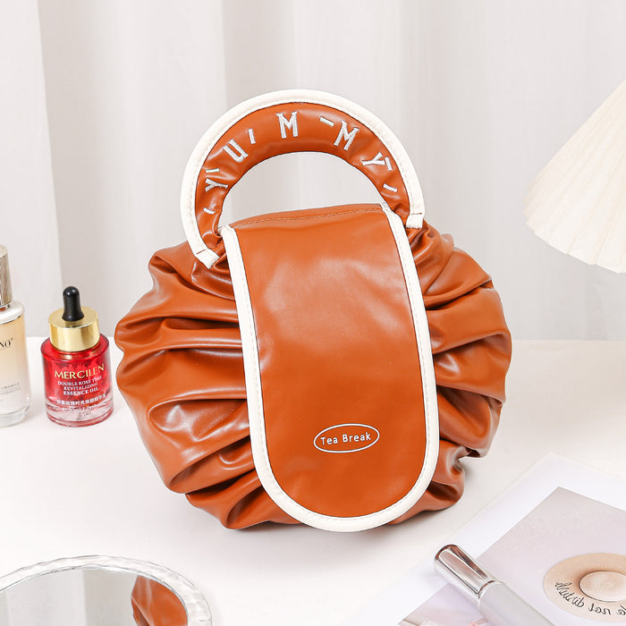 Wholesale PU Pink Cylindrical Cosmetic Bag Light Luxury Drawstring Travel Makeup Pouch For Women