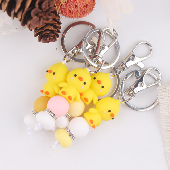 Wholesale Santa Cartoon Little Yellow Duck Silicone Beaded Keychain JDC-KC-GuangTian032