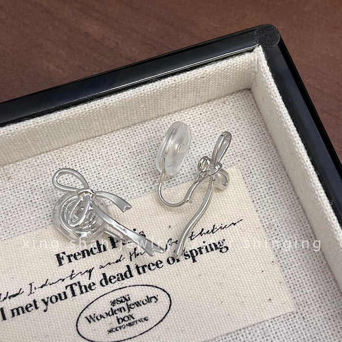 Wholesale Simple bow earrings girl fashion Joker cold wind earrings