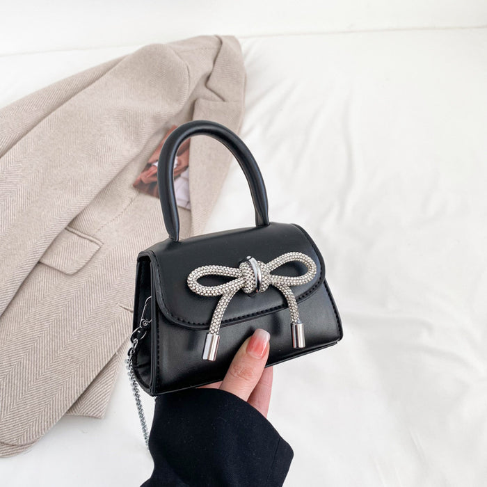 Wholesale New children's bag with diamond studded bow for girls, niche women's chain crossbody bag