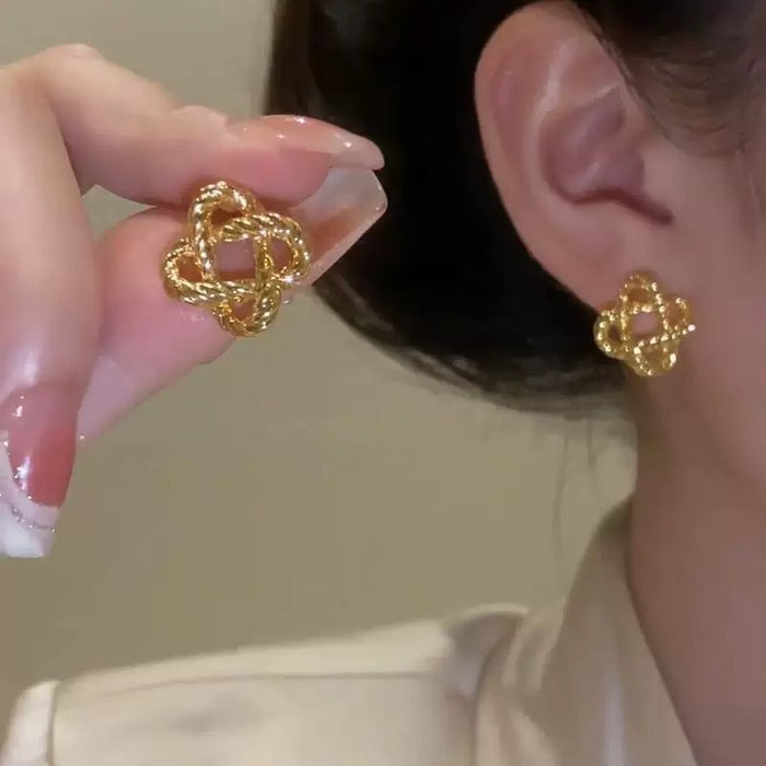 Wholesale Light luxury gold metal ear studs woven earrings with niche design earrings