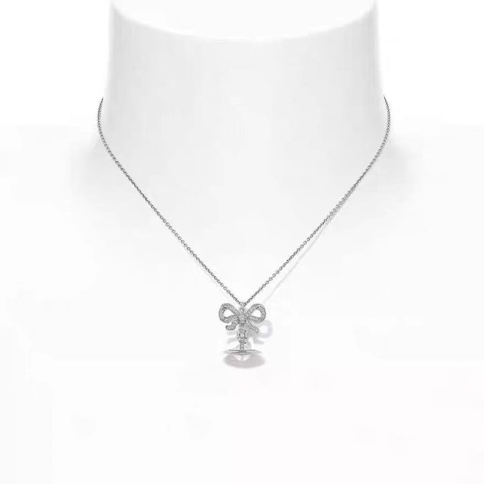 Wholesale  Saturn Necklace  sweater chain temperament Bow clavicle chain