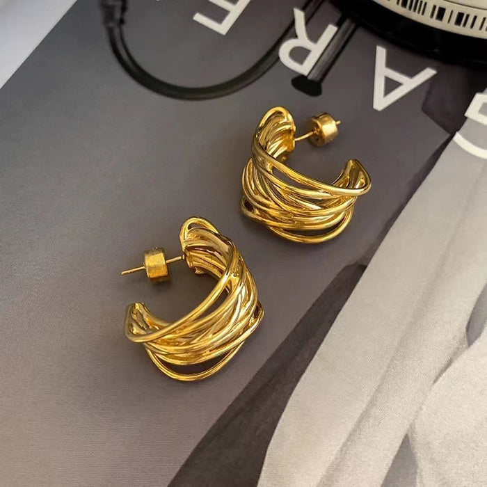 Wholesale Vintage-style wire-wrapped C-shaped hoop earrings in 18K gold.
