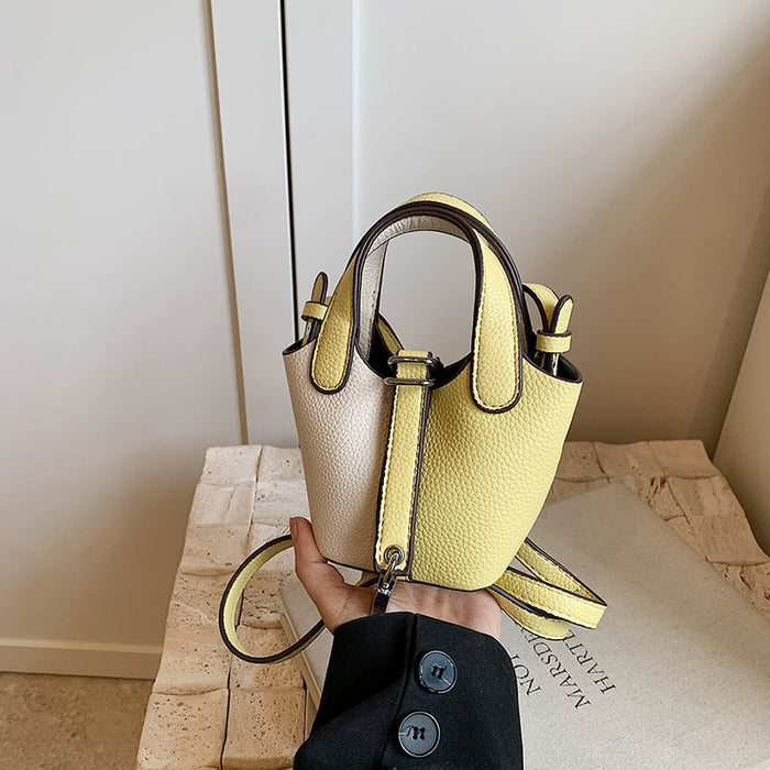 Wholesale Children's bag, high-end color blocked mini bucket bag, hand-held bucket bag, crossbody bag