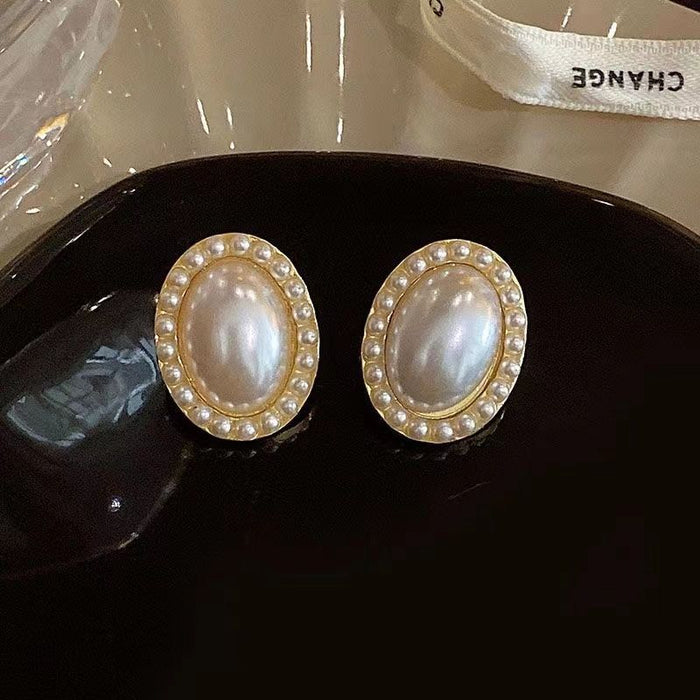 Wholesale Light luxury high-end pearl earrings with super sparkling zirconia diamond temperament earrings, trendy and versatile earrings