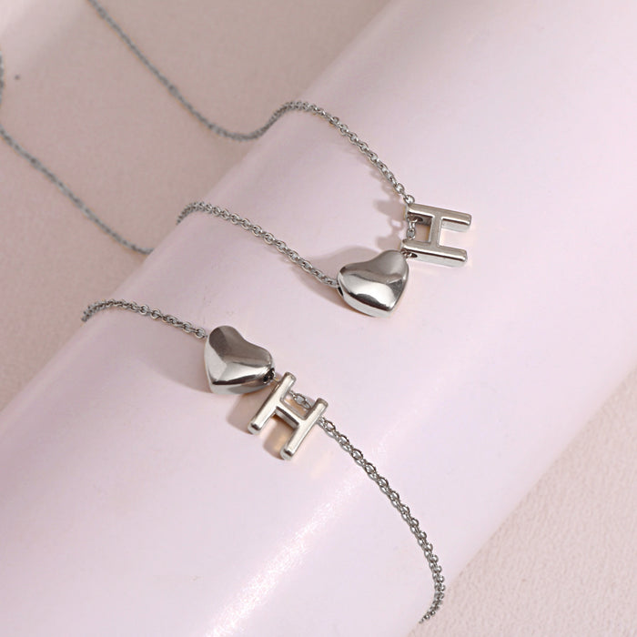 Wholesale Clavicle chain jewelry accessory 26 letter heart pendant titanium steel necklace