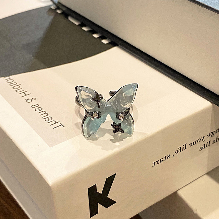 Wholesale Minimalist ice transparent blue rose ring with niche design, prickly butterfly, light luxury and personalized opening