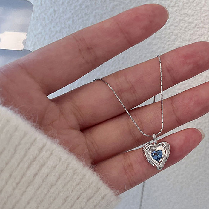 Wholesale Irregular hammer patterned heart-shaped necklace with niche design, blue zircon peach heart collarbone chain