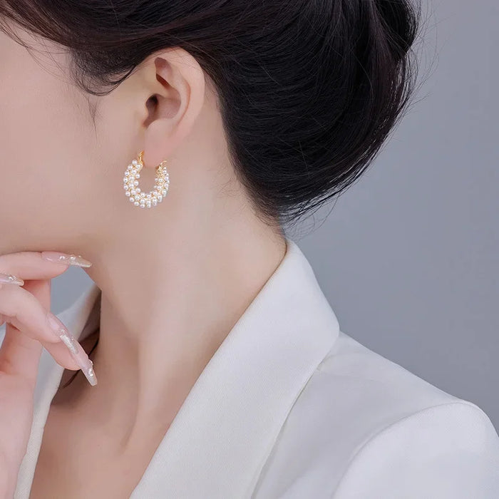 Wholesale Exquisite, fashionable, high-end pearl round ear buckle, light luxury, niche design, fashionable, gentle, versatile earrings