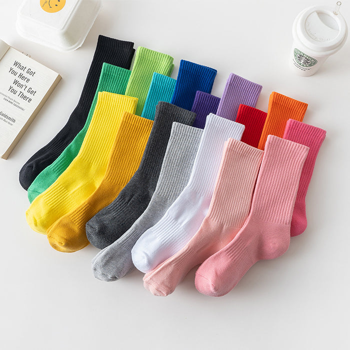 Wholesale Solid color high elastic looped socks for men and women, long socks for sports, cotton socks