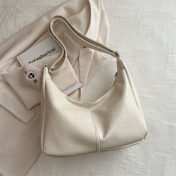 Wholesale Personalized retro tote bag for commuting, fashionable crossbody, simple shoulder bag