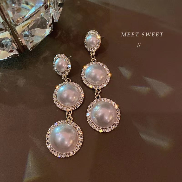 Wholesale Simple temperament pearl tassel earrings silver fashionable design earrings