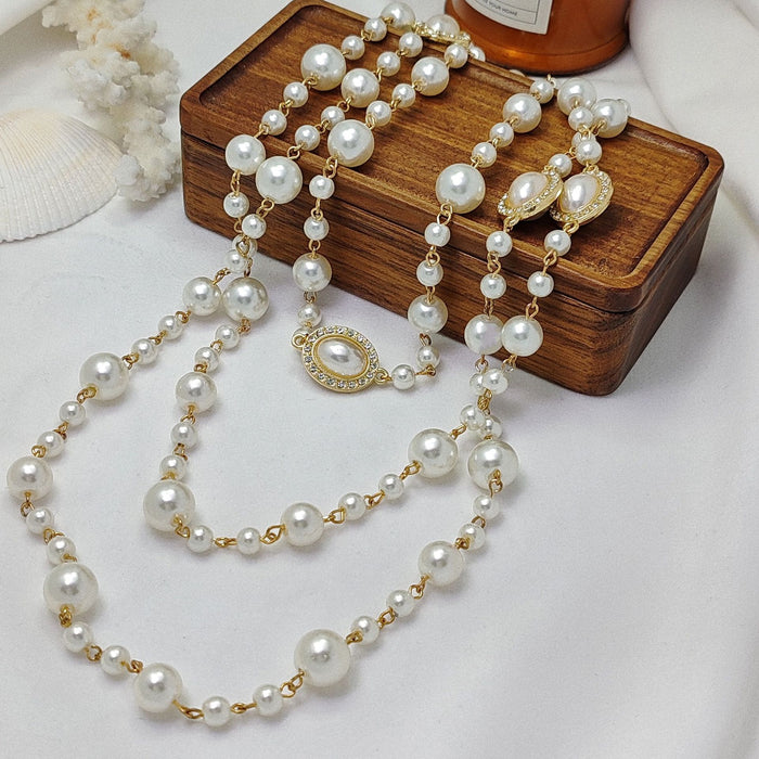 Wholesale Exaggerated long pearl necklace with multiple layers of light luxury niche sweater chain